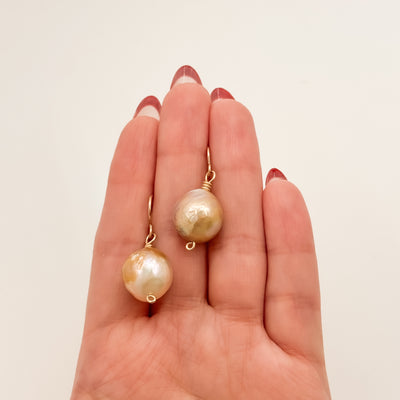 Single large Champagne Baroque pearl earrings