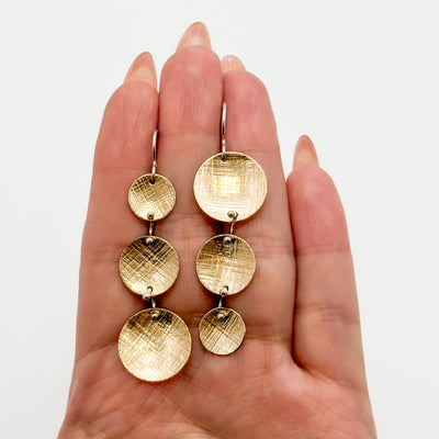 Rush Hour earrings with papyrus texture