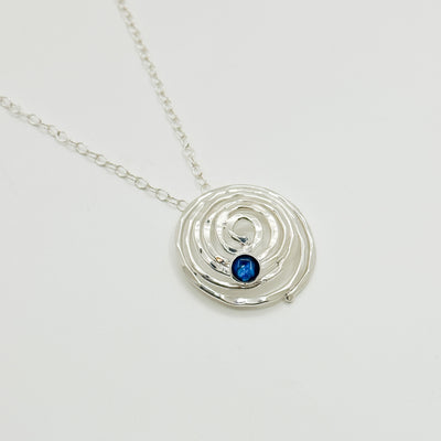 Domed spiral pendant with abalone necklace