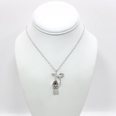 Birdhouse pendant with branch