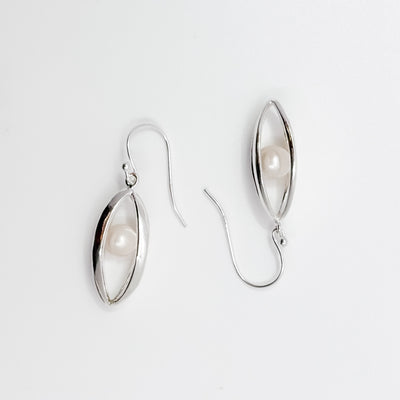 Big Cage Earrings with White trapped Freshwater Pearl