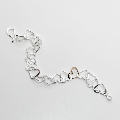 Mini Heart bracelet with hidden gold heart