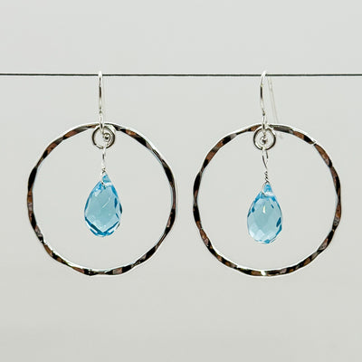 Hoop earrings with topaz drop