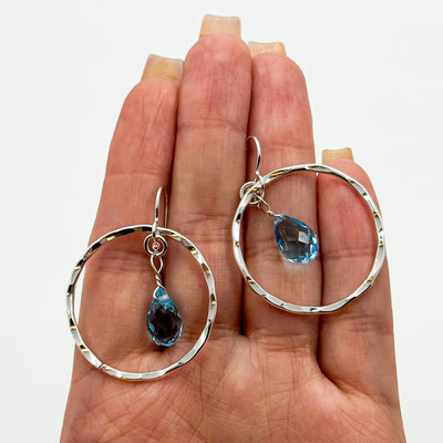 Hoop earrings with topaz drop