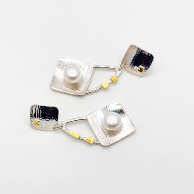 Pearl Power white button post earrings