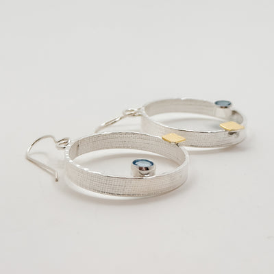 Mars earrings with 5mm faceted Swiss Blue Topaz