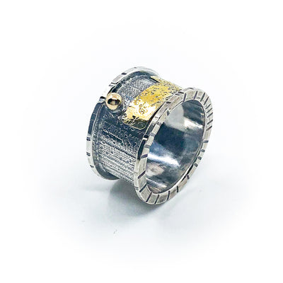 side angle view of size 9.5 Men's Sterling, 14k, 24k Waldo's Wing Ring by Judie Raiford