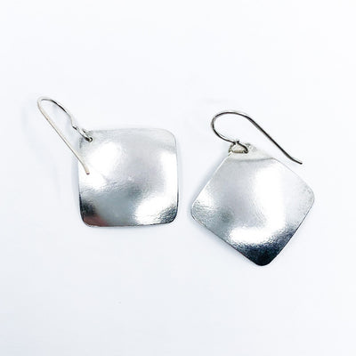 back side view of Sterling Non Stick Earrings with Peridot by Judie Raiford