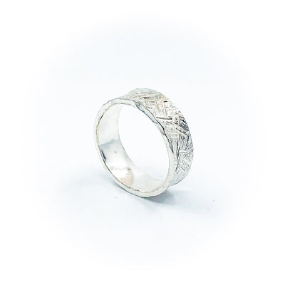 side angle view of size 11.25 Men's Sterling Mom's Hammer Cross Hatch Textured Ring by Judie Raiford