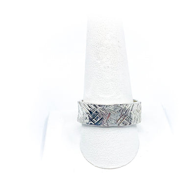 size 11.25 Men's Sterling Mom's Hammer Cross Hatch Textured Ring by Judie Raiford on a white ring display stand