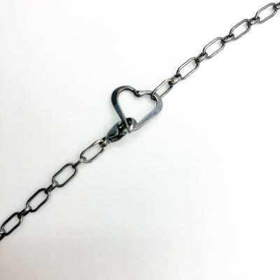 view of clasp with heart of Oxidized Sterling & 14k Gold Filled Ball Pein Circle Necklace by Judie Raiford