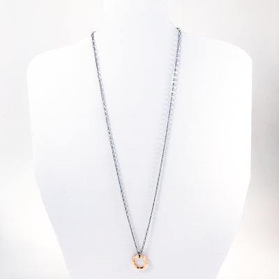Oxidized Sterling & 14k Gold Filled Ball Pein Circle Necklace by Judie Raiford hanging on white mannequin bust