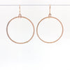 14k Gold Filled Mom's Hammer Flat Orbit Earrings by Judie Raiford hanging on wire