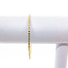 14k Gold Filled Cross Pein Bangle by Judie Raiford on white bracelet display stand