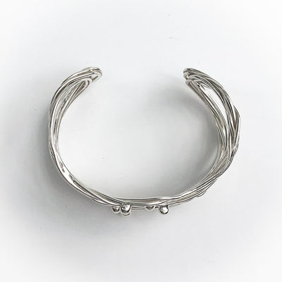 overhead view of Sterling Random Theory Bracelet by Judie Raiford