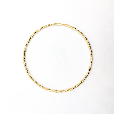 over top view of 14k Gold Filled Single Twist Bangle by Judie Raiford