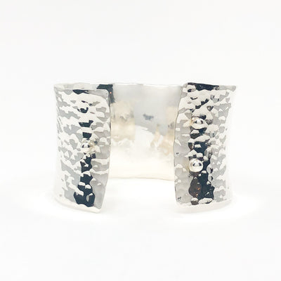 back side view of Sterling 1.5" Ball Pein Anticlastic Cuff by Judie Raiford