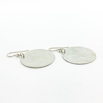 side angle view of Sterling Lynne Disc Earrings by Judie Raiford