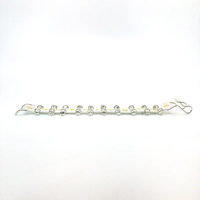 side angle view of Sterling and 22k Singer Bracelet by Judie Raiford