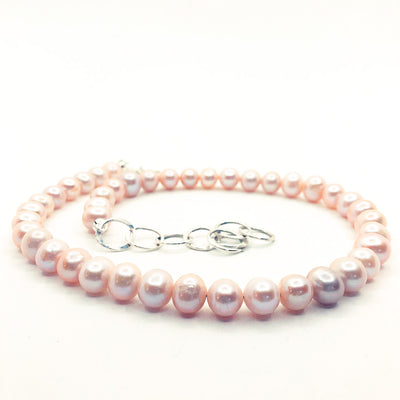 side angle view of Blush Pearl Necklace by Judie Raiford