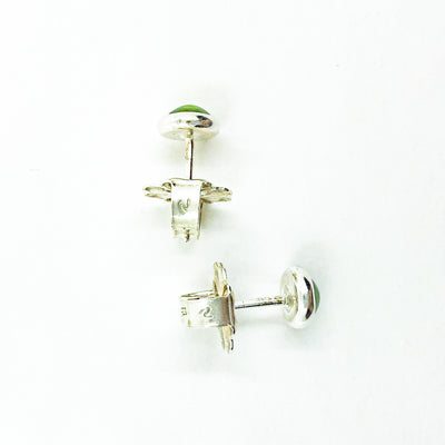 over head view of 6mm Peridot Cabochon Stud Earrings by Judie Raiford