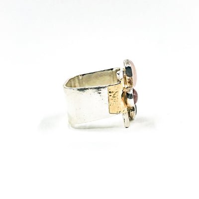 left side view of size 9.5 Sterling & 24k Crotch Hugger Ring with Pink Quartz, Pink Tourmaline, and Garnet by Judie Raiford