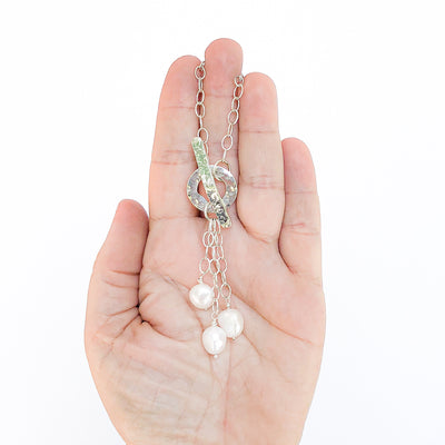 Dale 3-Pearl Lariat Necklace by Judie Raiford held in hand