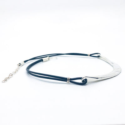 side angle view of Sterling Half Naught Necklace with Leather Cord by Judie Raiford