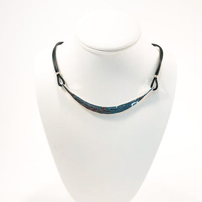 Sterling Half Naught Necklace with Leather Cord by Judie Raiford displayed on white mannequin bust