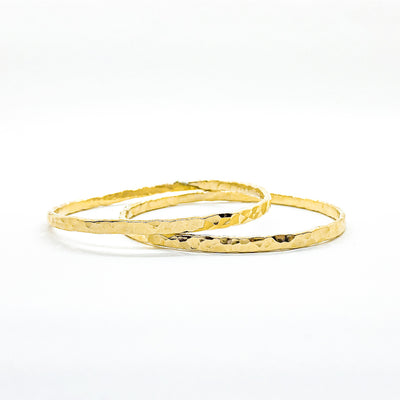 pair of 14k Gold Filled Ball Pein Hammered Bangle by Judie Raiford