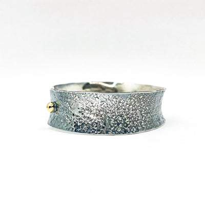 left side view of 3/4" Mom's Hammer Oxidized Sterling Anticlastic Cuff with 14k Gold Balls by Judie Raiford