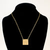 14k Gold Filled Mom's Hammer Square Necklace by Judie Raiford displayed on black mannequin bust