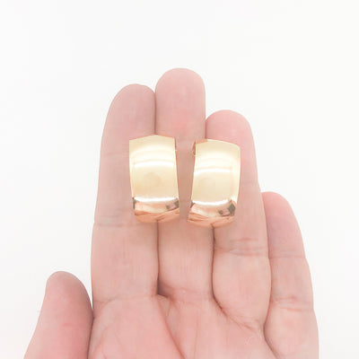 14k Gold Filled Wedding Ring Hoop Earrings by Judie Raiford held in hand