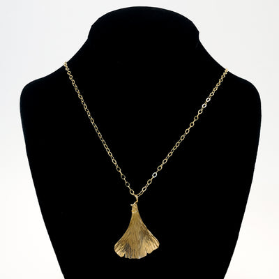 14k Gold Filled Ginkgo Necklace by Judie Raiford on black mannequin bust