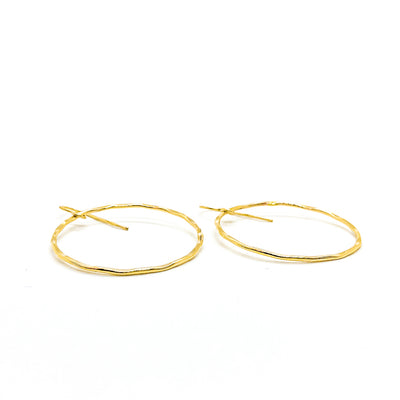 side angle view of 14k Gold Filled Large Orbit Earrings by Judie Raiford
