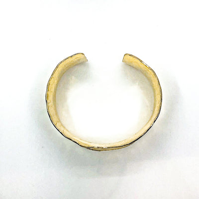 over top view of 3/4" 14k Gold Filled 3/4" Ball Pein Anticlastic Cuff by Judie Raiford