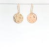 14k Gold Filled ball Pein Hammered Mini Circle Earrings by Judie Raiford hanging on wire