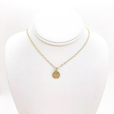 14k Gold Filled Hammered Mini Circle Necklace by Judie Raiford displayed on a white mannequin bust