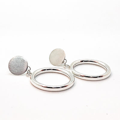 side angle view of sterling silver Marilyn Monroe Earrings by Judie Raiford