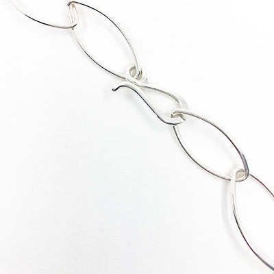 J hook clasp detail of Sterling Triple Strand Baguette Necklace by Judie Raiford