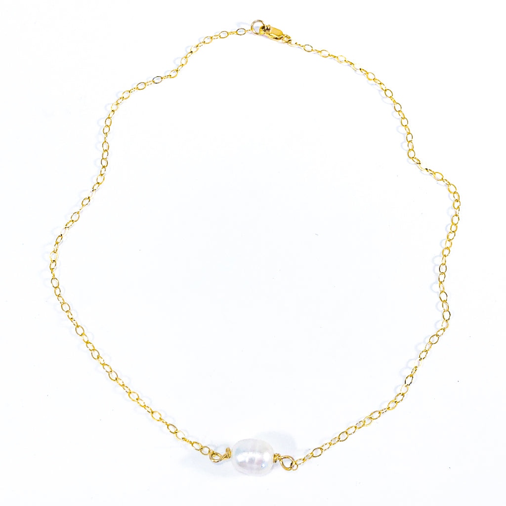 Flat Lay view of White Baroque Pearl on 14k Gold  Filled Chain Necklace by Judie Raiford