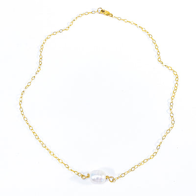 Flat Lay view of White Baroque Pearl on 14k Gold  Filled Chain Necklace by Judie Raiford
