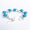 Side Curl  view of Not Naught Round Sterling Bracelet with Turquoise by Judie Raiford