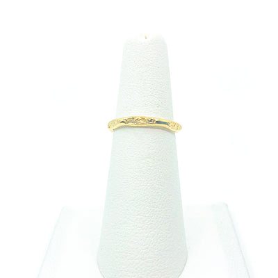 14k Gold Filled Hammered Stack Ring by Judie Raiford displayed on white ring stand