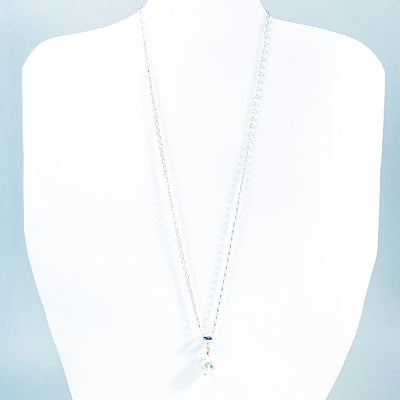 White Baroque Pearl on Sterling Long Short Chain by Judie Raiford on white mannequin display bust