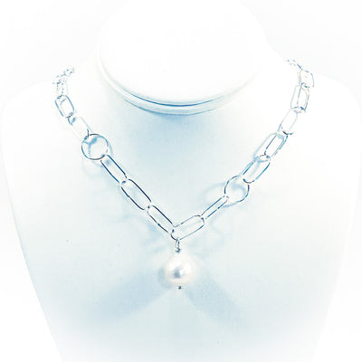 Baroque Pearl on Handmade Chain Necklace by Judie Raiford on white display mannequin