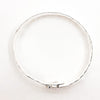 over top view of Sterling Bypass Anticlastic Bangle by Judie Raiford