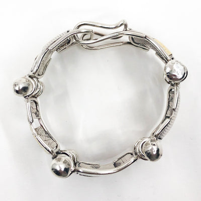 over top view of Sterling and 24k J Edgar Bracelet by Judie Raiford