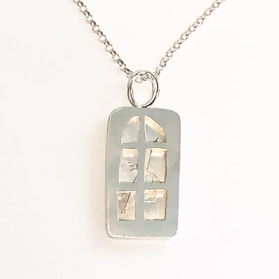 Close up detail of pendant part of Windows of Opportunity Necklace by Ling-Yen Jones