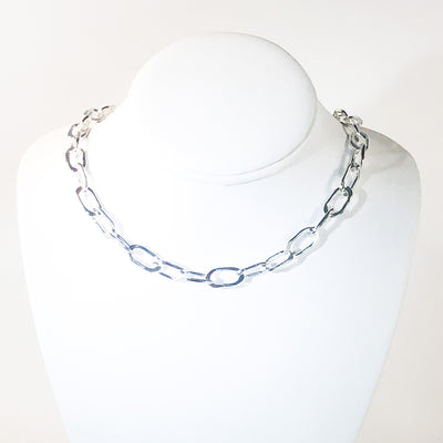 Sterling Junior Tow Truck Necklace by Judie Raiford on mannequin bust